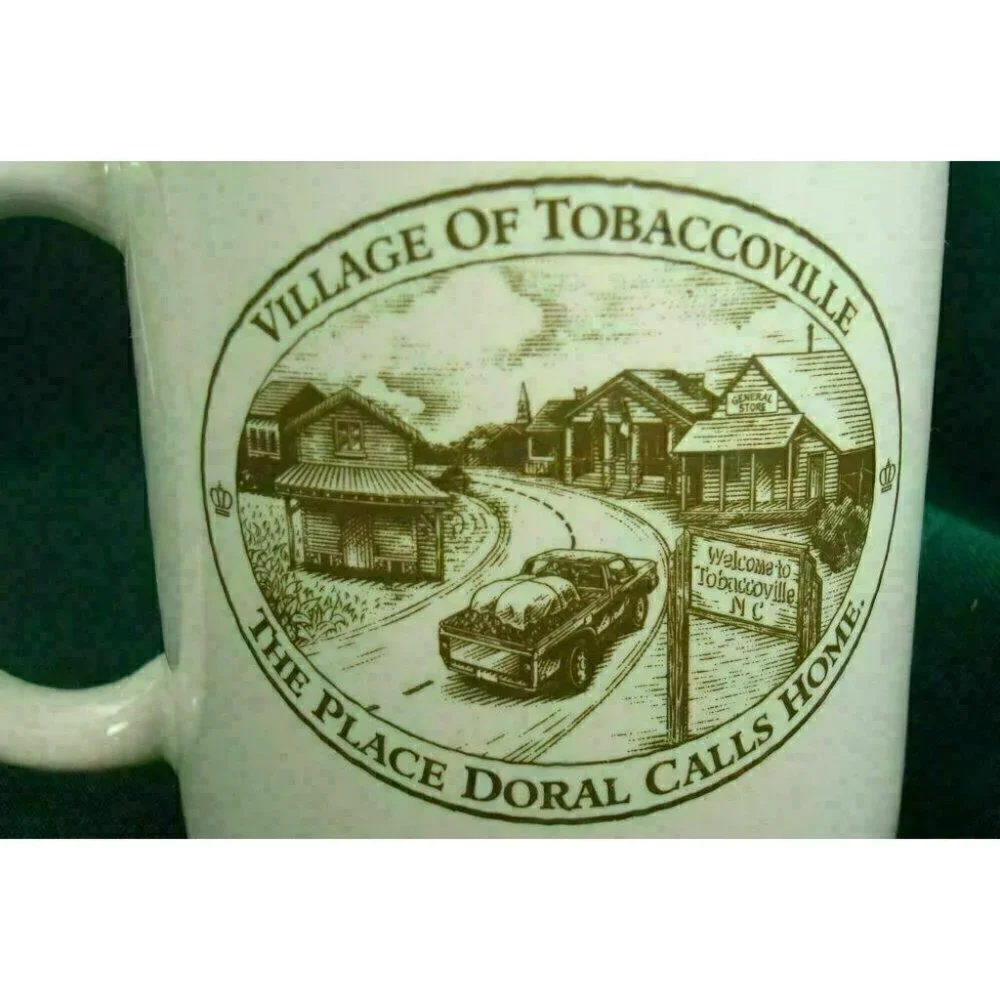 Village of Tobaccoville The Place Doral Calls Home Coffee Cup Mug Cigarettes Vtg